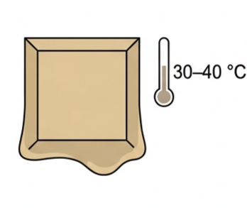 Chocolate softening and melting in a hand, with a thermometer showing a melting point of around 30-40 degrees Celsius